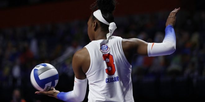 T'ara Ceasar serving in Saturday's Gators Volleyball match against Arkansas