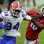 Pitts stiff arms defender