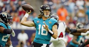 Trevor Lawrence throws the ball in Week 1 game against Houston