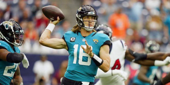 Trevor Lawrence throws the ball in Week 1 game against Houston