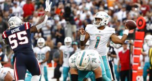 Miami Dolphins quarterback throws ball