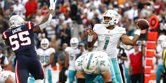 Miami Dolphins quarterback throws ball