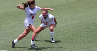 Gator soccer players running