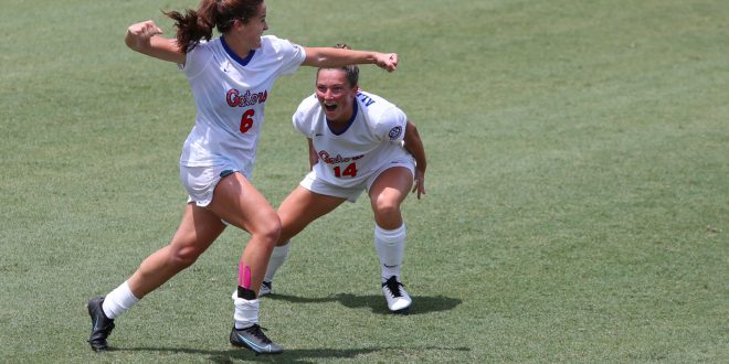 Gator soccer players running