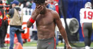 Shirtless Antonio Brown exits the field