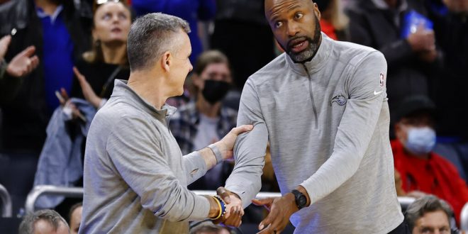 Orlando Magic and Chicago Bulls coach shake hands