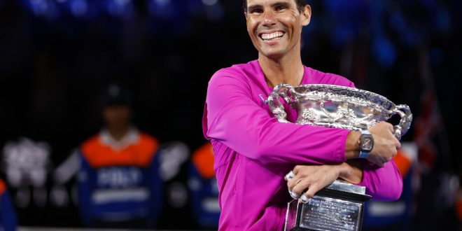 Rafal Nadal hugs trophy