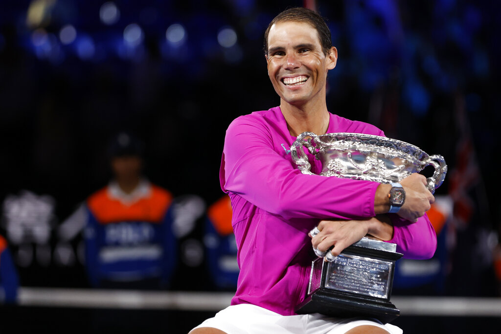 Rafal Nadal hugs trophy