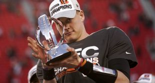 Joe Burrow holds AFC trophy after Bengals OT win