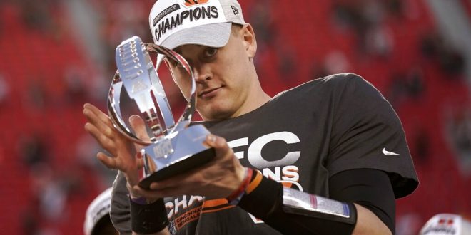 Joe Burrow holds AFC trophy after Bengals OT win