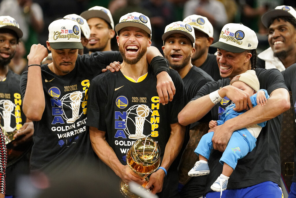 Steph Curry and his four NBA rings with Warriors