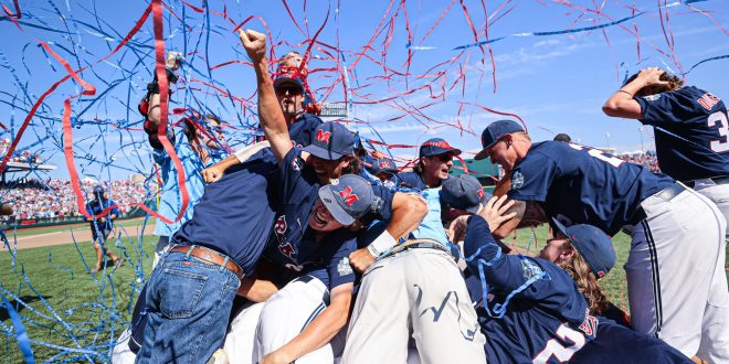 Ole Miss celebrates with a dogpile after striking out the last three Sooners to secure their title as the 2022 Men's College World Series National Champions.