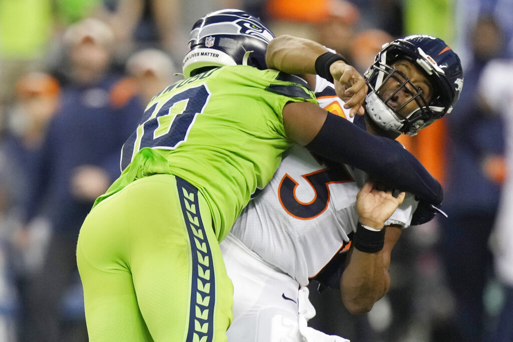 Russell Wilson Wins Walter Payton NFL Man of the Year Award