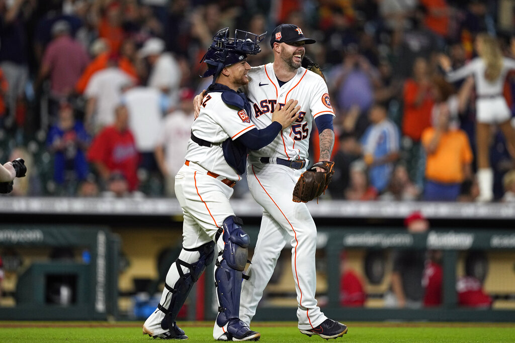 Houston Astros relief pitcher Ryan Pressly (55) celebrates getting