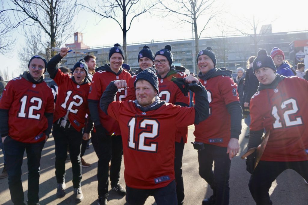 Eight fans wearing Tom Brady's Buccaneers jersey