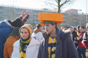 Green Bay Packers fans dress in traditional game attire— including the beloved Cheesehead Hat. During the game, you could find fans of all teams in the NFL cheering on the game.