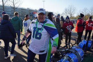 A Seahawks fan from Ireland cheers for his team during the NFL Fan Fest. Fans from all over Europe and beyond made their way to Munich, Germany for the Sunday, Nov. 13 game.