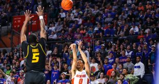 Florida guard Myreon Jones knocking down the 3-point basket to give the Gators the lead over the Missouri Tigers