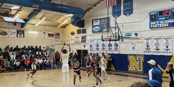 Newberry Basketball Player Juwan Scippio shooting a 3- pointer