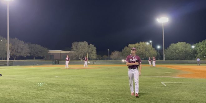 Troy Freeman leaving the mound for Oak Hall