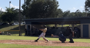 Neil Ruth swinging for Oak Hall