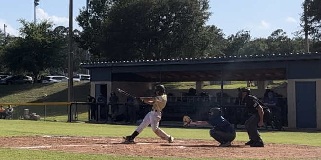 Neil Ruth swinging for Oak Hall