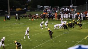 Hawthorne QB C.J. Ingram prepares to take the snap against Newberry.