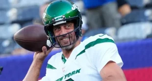 Jets quarterback Aaron Rodgers takes the field against the Buffalo Bills on Monday. (USATI)