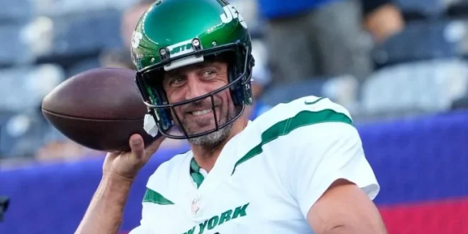 Jets quarterback Aaron Rodgers takes the field against the Buffalo Bills on Monday. (USATI)