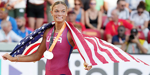 Anna Hall (USA) takes a victory lap with United States flag after placing second in the heptathlon during the World Athletics Championship