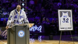 Shaquille O'Neal speaking at his Orlando Magic jersey retirement ceremony.