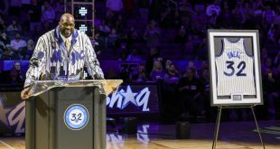 Shaquille O'Neal speaking at his Orlando Magic jersey retirement ceremony.