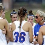 Florida coach Amanda O'Leary (right) talks to her team during a game at Donald R. Dizney in 2024.