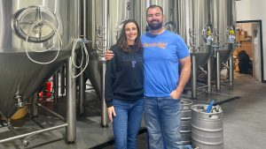 Former Gators lineman Jim Barrie (right) and his wife Brittney opened BarrieHaus Beer Co. in Ybor City in 2019.
