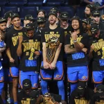 Oklahoma City Thunder players celebrate after winning the NBA basketball championship with a Game 7 victory against the Indiana Pacers Sunday, June 22, 2025, in Oklahoma City. (AP Photo/Nate Billings)