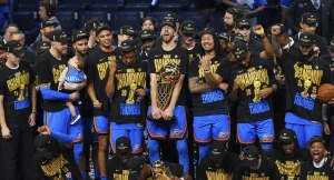 Oklahoma City Thunder players celebrate after winning the NBA basketball championship with a Game 7 victory against the Indiana Pacers Sunday, June 22, 2025, in Oklahoma City. (AP Photo/Nate Billings)