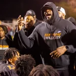 Coach Ingram addresses his team during 2023 state title season
