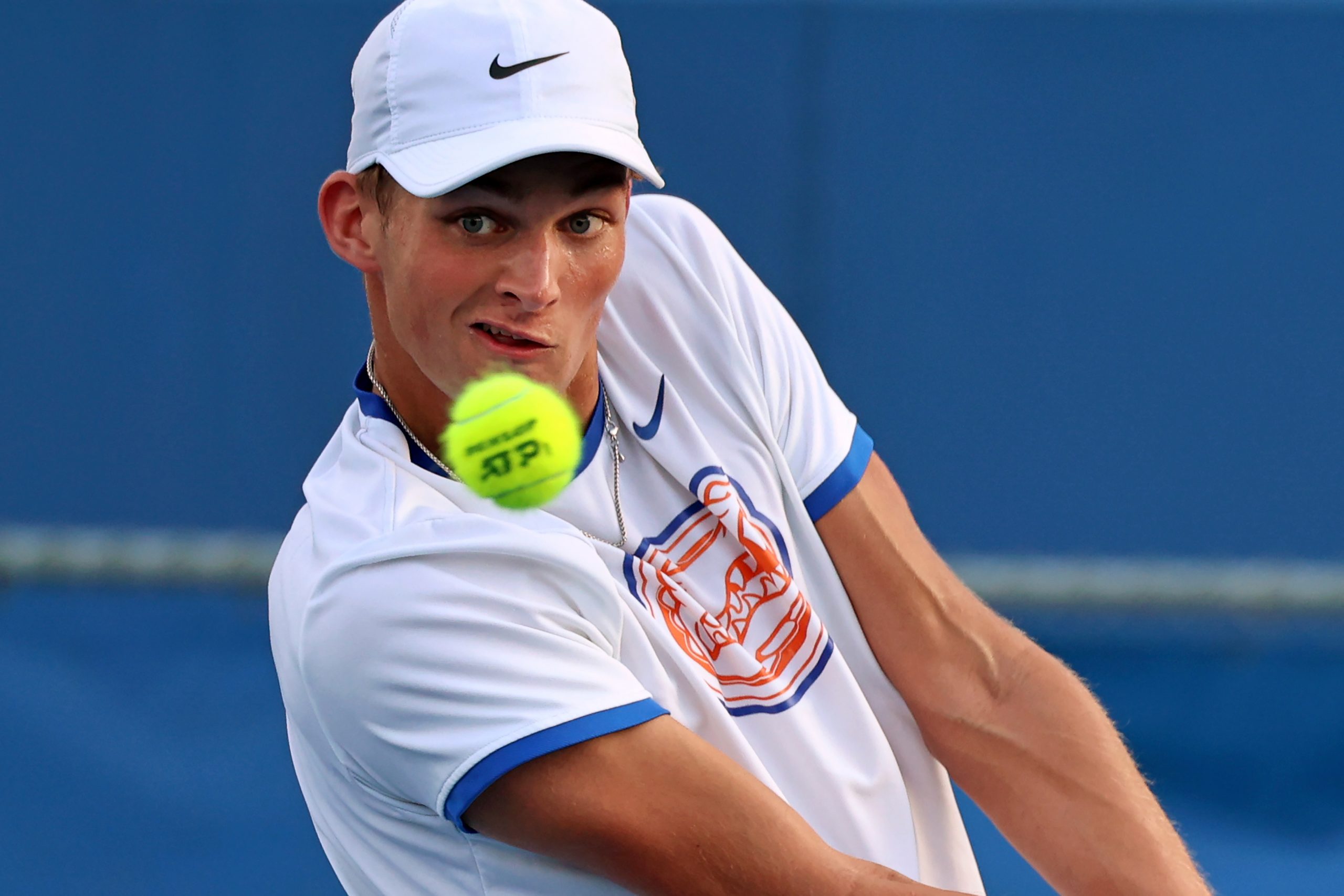 UF's Henry Jefferson hits the ball during the UF vs. FGCU match at the Alfred A. Ring Tennis Complex in Gainesville, Fla., Sunday, Feb. 2, 2025.