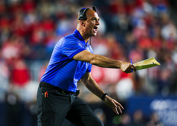 Florida Gators interim head coach Billy Gonzales reacts to a play against the Ole Miss Rebels (Petre Thomas-Imagn Images)