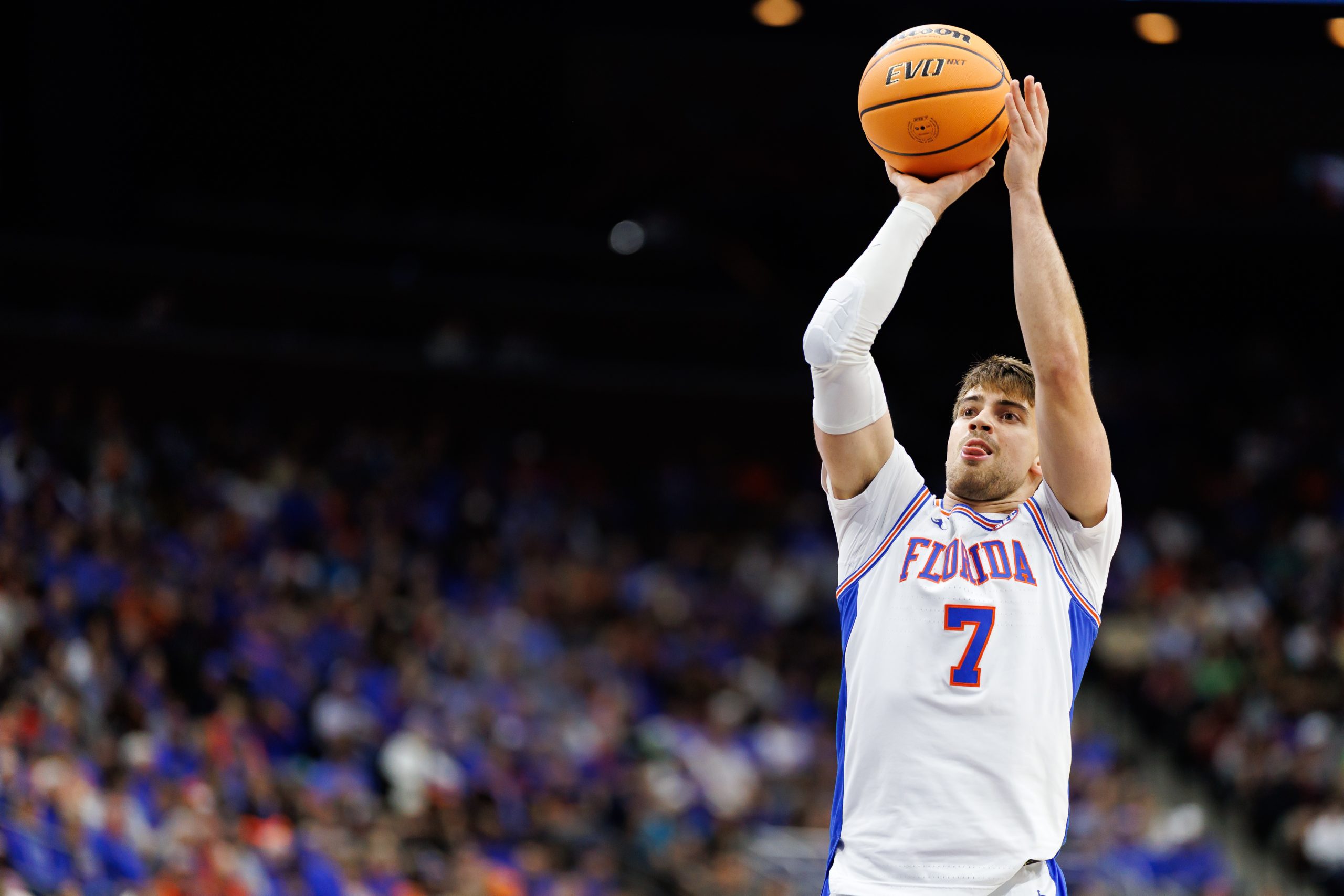 Nov 16, 2025; Jacksonville, Florida, USA; Florida Gators guard Urban Klavzar (7) shoots the ball against the Miami Hurricanes during the first half at VyStar Veterans Memorial Arena.
