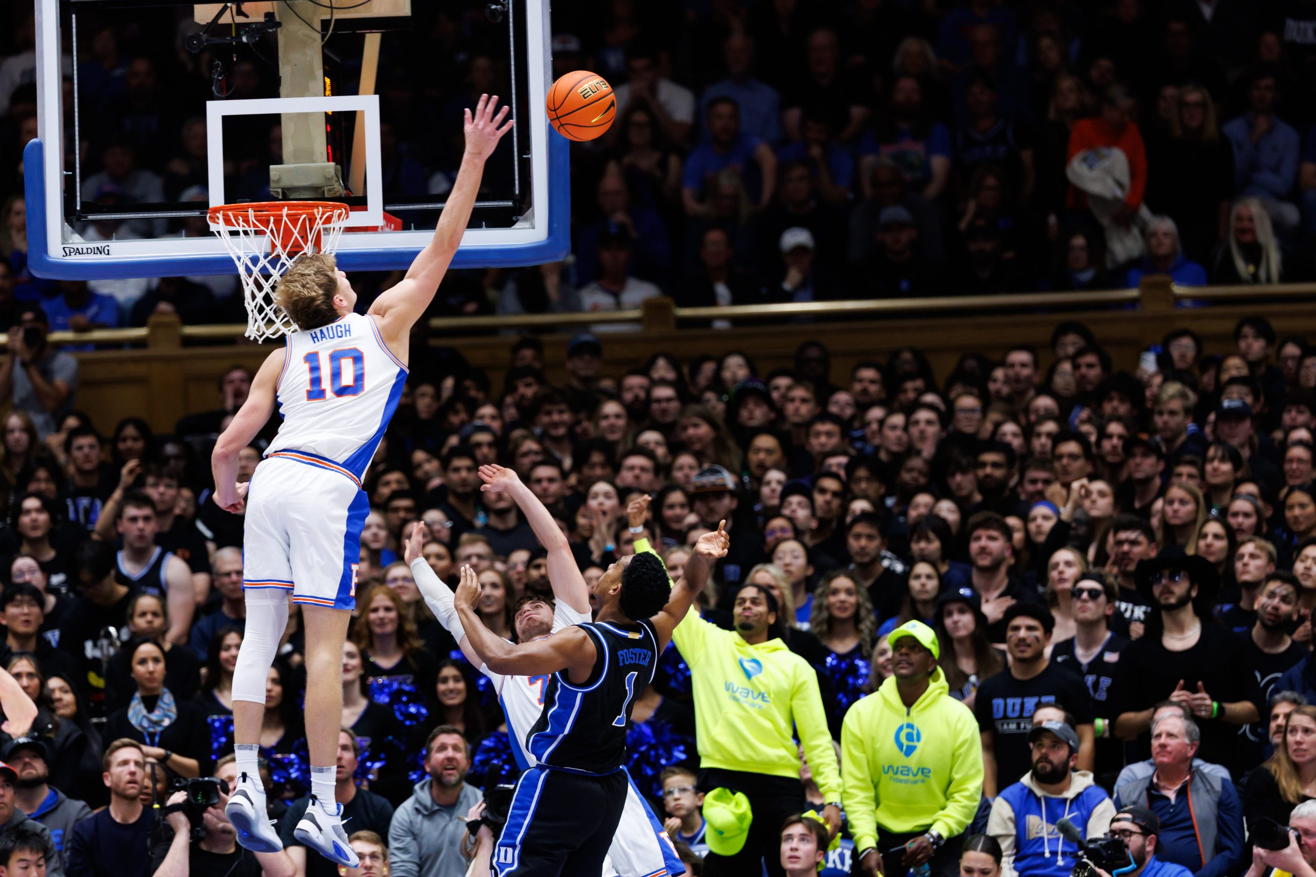 Florida forward Thomas Haugh blocks a shot by Duke guard Caleb Foster at Cameron Indoor Stadium on Tuesday, Dec. 2, 2025.