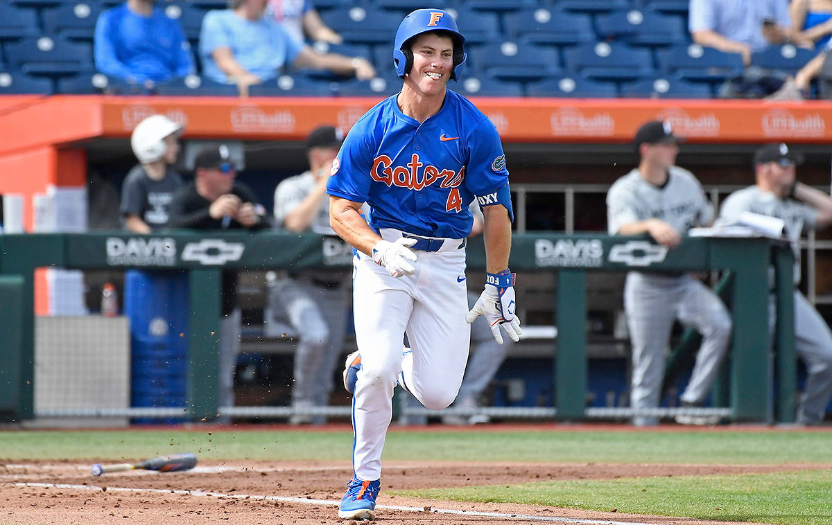 Florida infielder Cade Kurland (4) sprints to first base as the Florida Gators face the Air Force Falcons on Saturday, Feb. 15, 2025, at Condron Family Ballpark in Gainesville, Fla. (Matthew Lewis/WRUF)