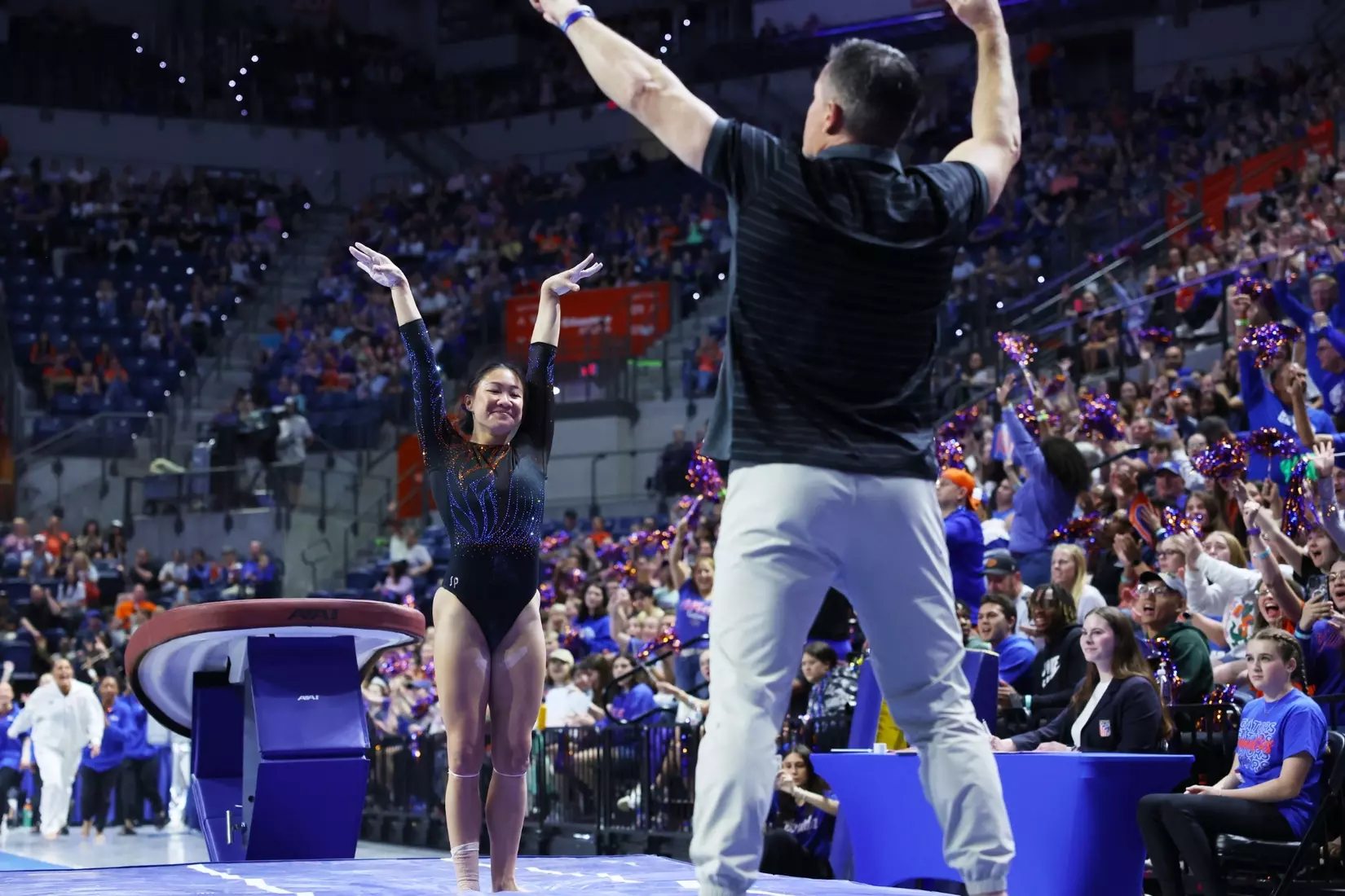 Riley McCusker swings on the bars as Florida gymnastics beat Arkansas on Friday, Jan. 30, in Gainesville.