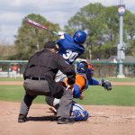 Outfielder Ashton Wilson takes a swing on the box during Week Three scrimmages.