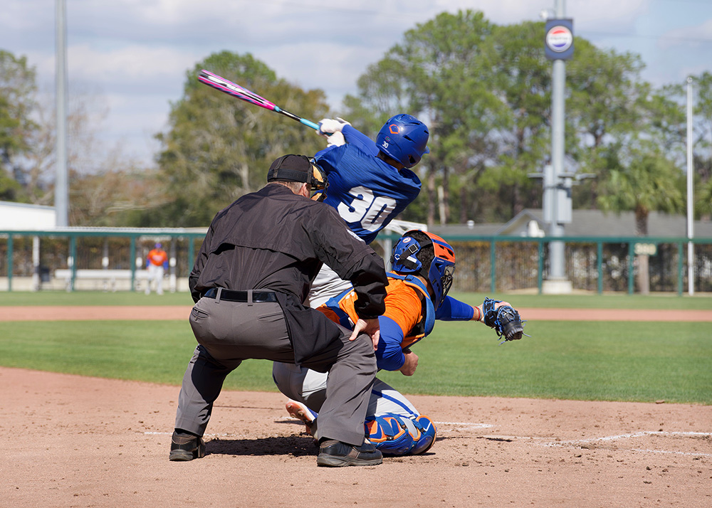 Outfielder Ashton Wilson takes a swing on the box during Week Three scrimmages.