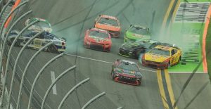 Tyler Reddick (center) survived the last-lap carnage at Daytona International Speedway to earn his first career Daytona 500 victory.