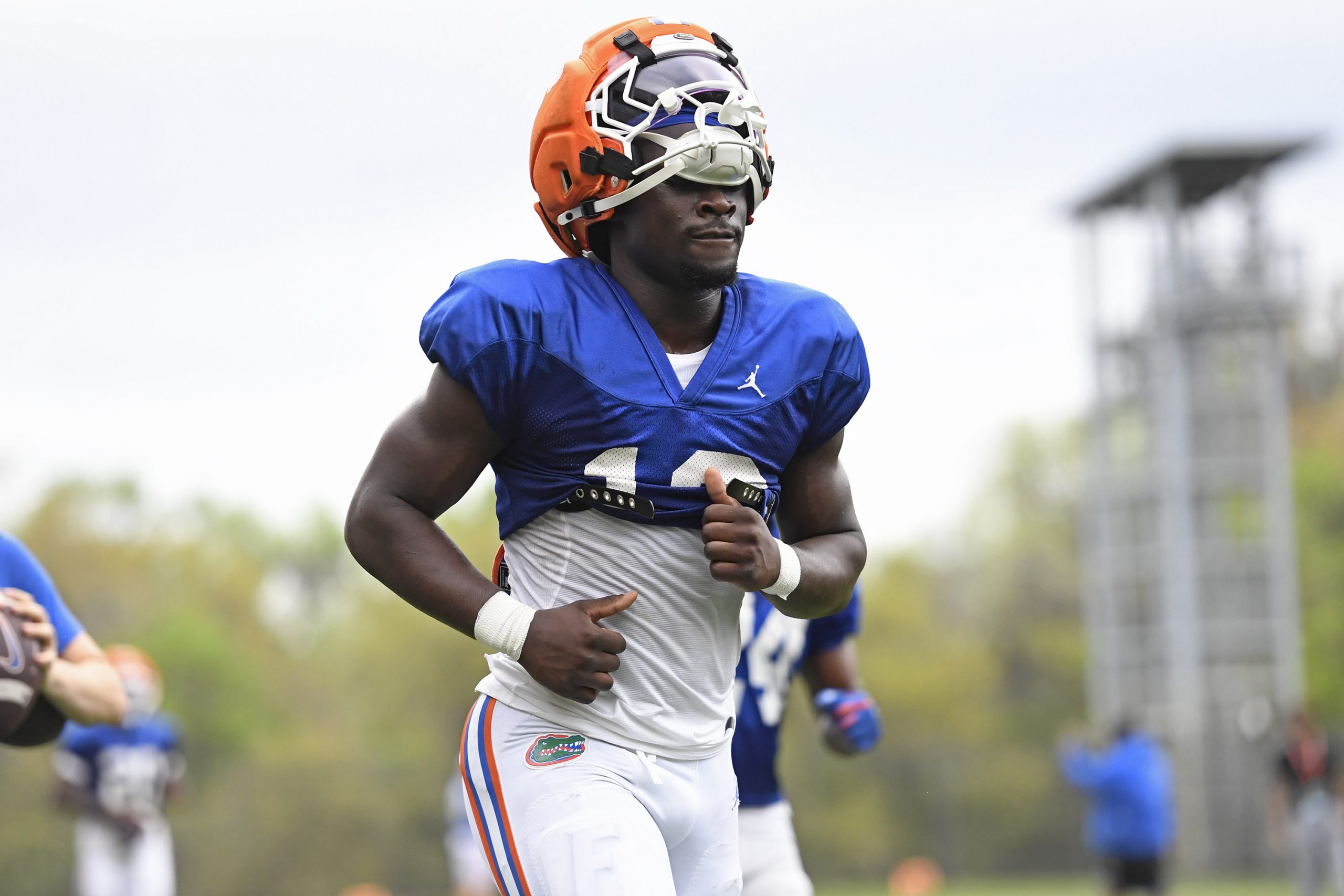 Florida running back Jadan Baugh (13) jogs as the Florida Gators practice on Thursday, March 12, 2026, at the James W. "Bill" Heavener Football Training Center in Gainesville, Fla.