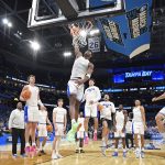 Florida guard CJ Ingram (11) dunks pregame as the Florida Gators face the Iowa Hawkeyes on Sunday, March 22, 2026, at Benchmark International Arena in Tampa, Fla.