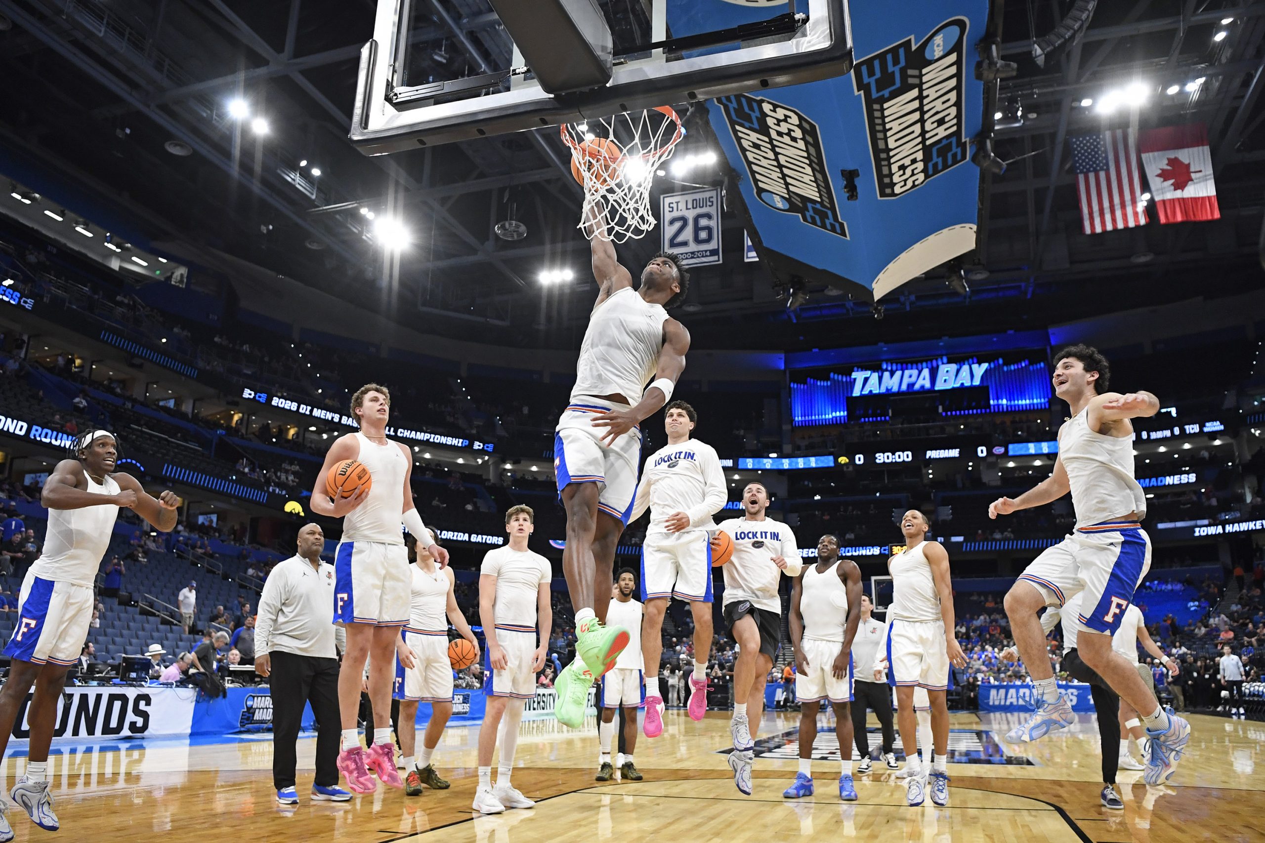 Florida guard CJ Ingram (11) dunks pregame as the Florida Gators face the Iowa Hawkeyes on Sunday, March 22, 2026, at Benchmark International Arena in Tampa, Fla.