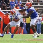 Florida offensive lineman TJ Dice Jr. (55) tackles Florida jack linebacker Charles Emanuel III (55) during Florida Orange and Blue game at Ben Hill Griffin Stadium in Gainesville, Fla., Saturday night, April, 11 2026.